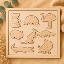 Wooden puzzle with animal shapes on a beige background
