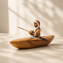 Wooden Eskimo With Canoe