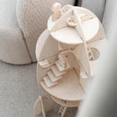 Wooden model of a house on a light gray surface