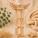 Wooden architectural model on a beige background with decorative elements