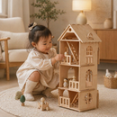 Child playing with a wooden dollhouse in a cozy living room.