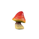 A hand-carved wooden mushroom toy with a red cap and yellow stem, with details and a natural wood finish.
