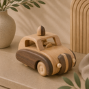 Wooden toy car on a beige surface with a neutral background