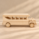 Side profile of the Bartu Bennett wooden school bus in soft natural light.