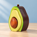 Wooden Avocado Stacker photographed on a natural wood tabletop
