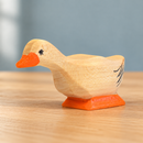 Wooden Duck - Curious photographed on a natural wood tabletop