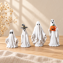Four Noelino Toys Wooden Spooky Ghost designs styled together on pale wood in natural light.