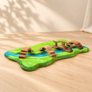 Large Wooden Bridge styled with other Noelino wooden bridges across a green and blue river play base