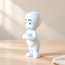 Wooden Little Ghost - Hands Clasped by Noelino Toys, three-quarter view in a warm natural-light setting.