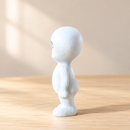 Wooden Little Ghost - Arms at Sides by Noelino Toys, left side view in a warm natural-light setting.