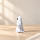Wooden Spooky Ghost - Small Ghost by Noelino Toys, left side view in a warm natural-light setting.