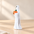 Wooden Spooky Ghost - Pumpkin Ghost by Noelino Toys, left side view in a warm natural-light setting.