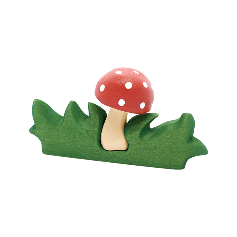 Wooden Mushroom in Grass