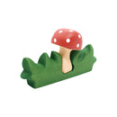Wooden Mushroom in Grass